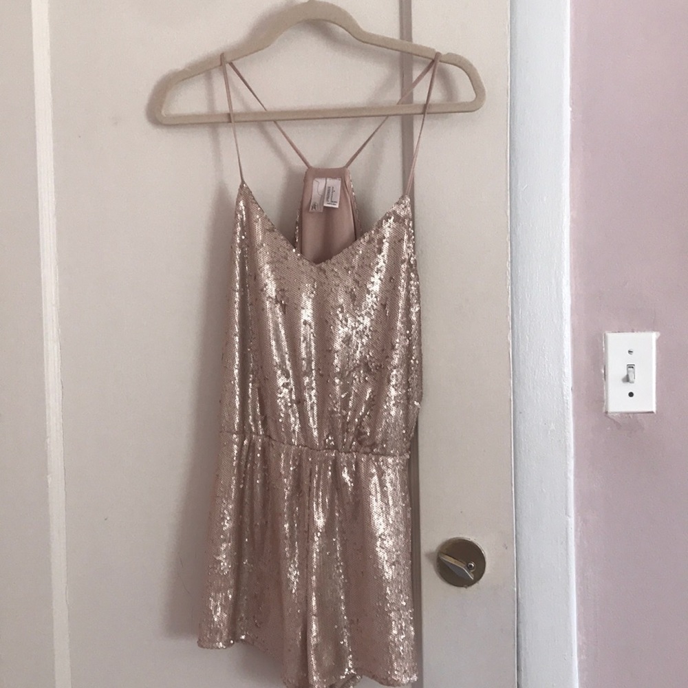 Silvery-gold sparkly romper